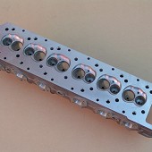 V12 JAGUAR CYLINDER HEAD MACHINED CASTING.